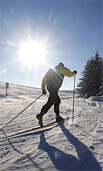 Skifahrer auf Loipe